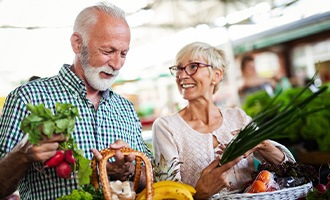 older couple shopping for food