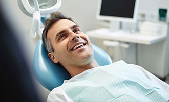 Man smiling with dental implants