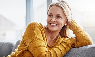 a woman smiling comfortably with a bright smile